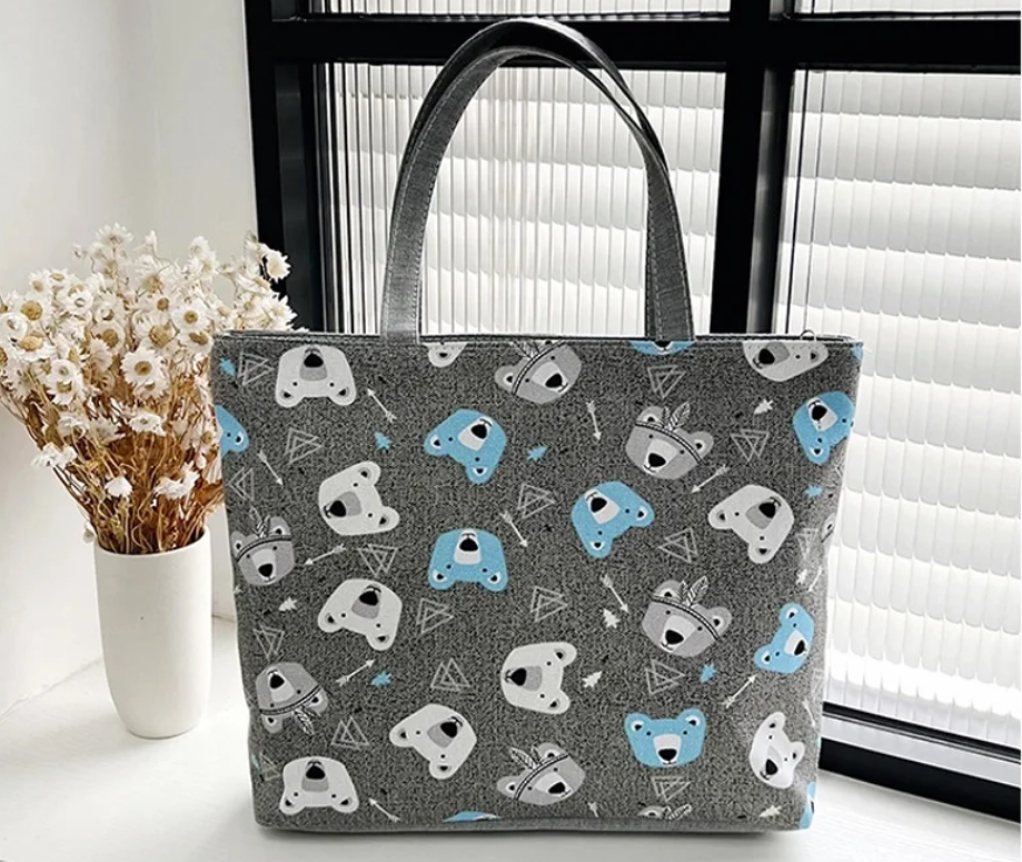 Bolso con motivos de animales en algodón y lino.