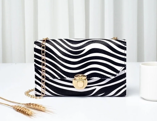Bolso de mano pequeño.